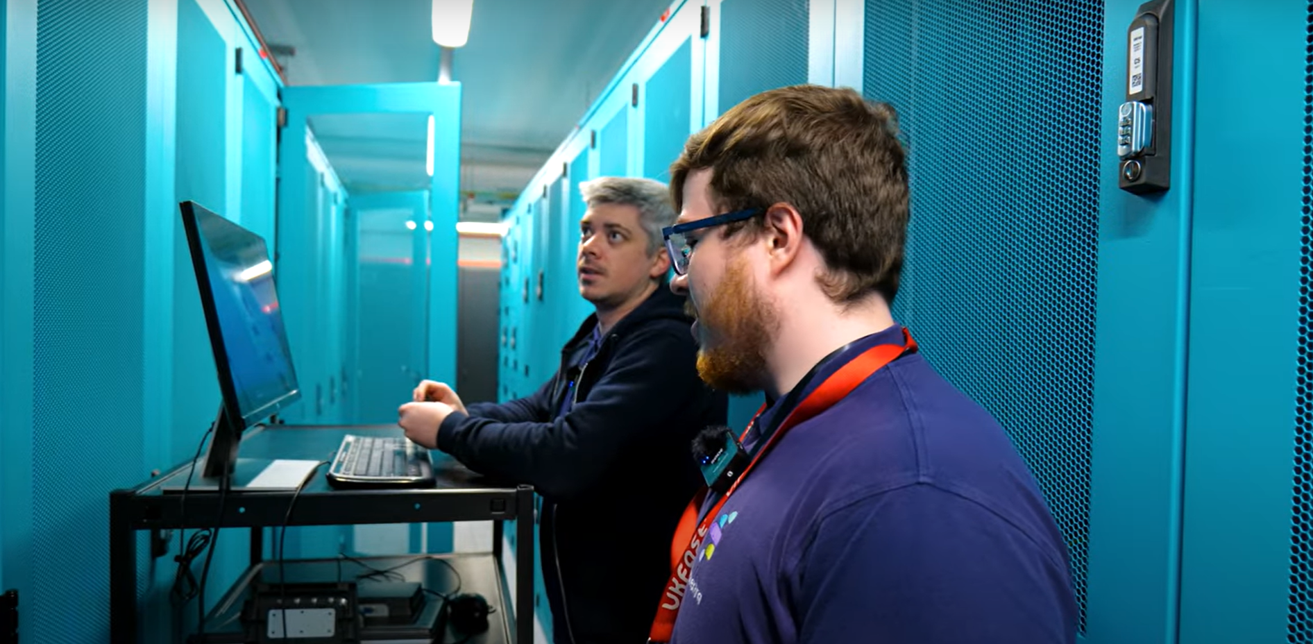 synextra employees in blue data centre installing new servers